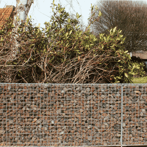 Breuksteen Lava 40/80 gebruikt in steenkorven met een natuurlijke uitstraling.